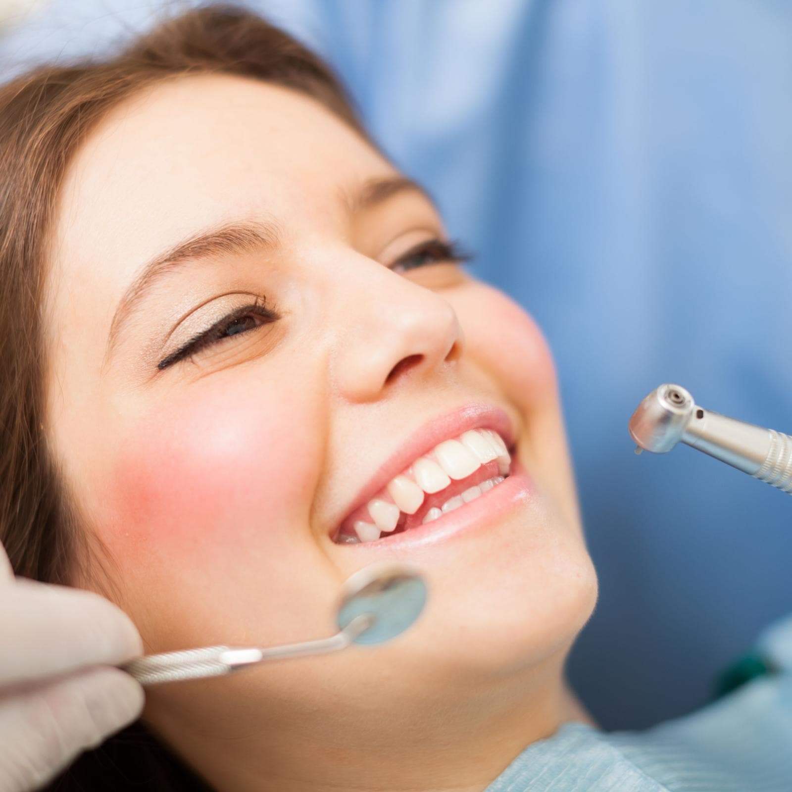 Patient smiling during a dental visit at Ambar Dental